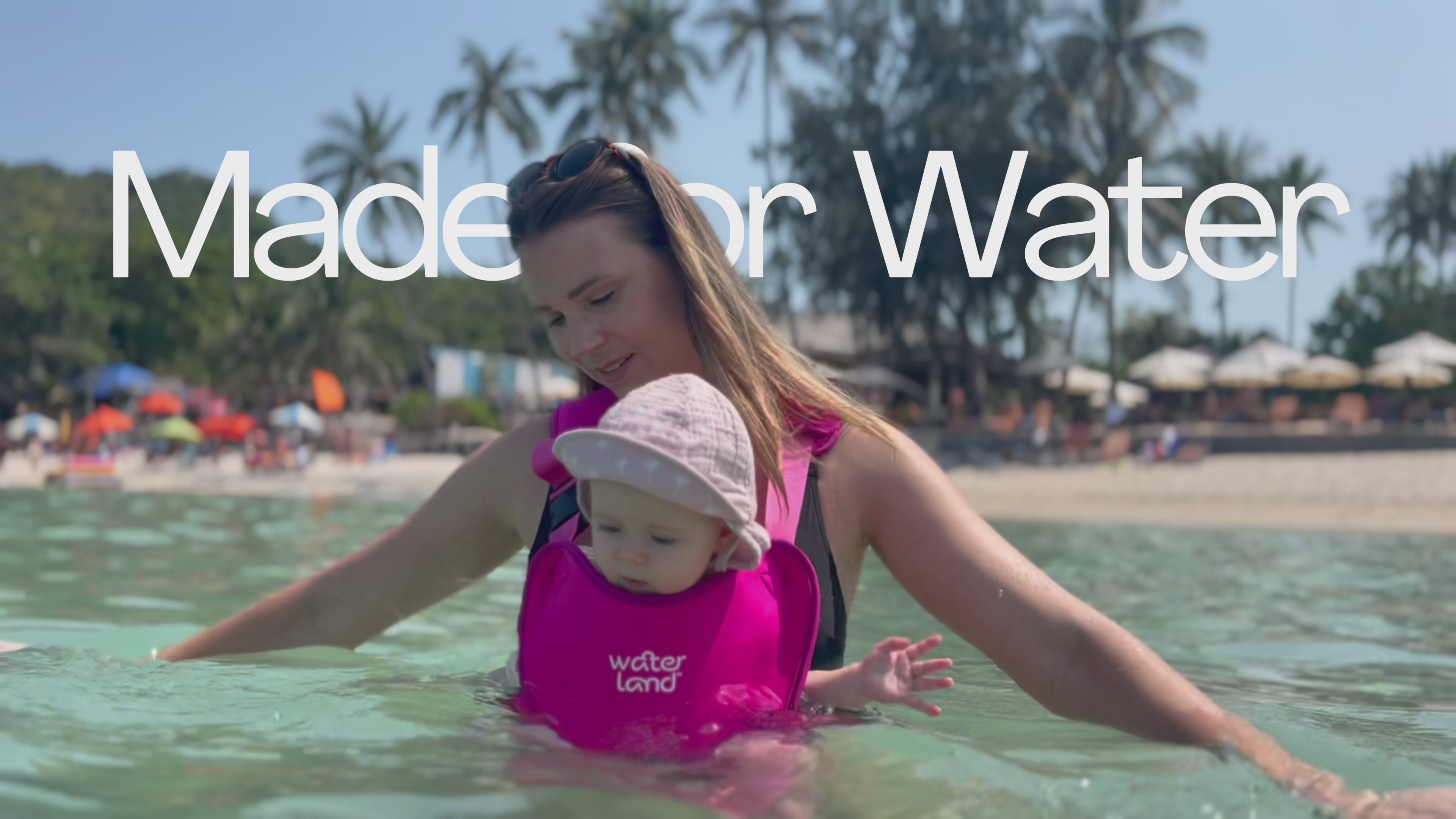 Load video: The Water &amp; Land Baby Carrier - The First Carrier Made for Water. Safely carry your baby in Water &amp; on Land. Designed for safe and close bonding.